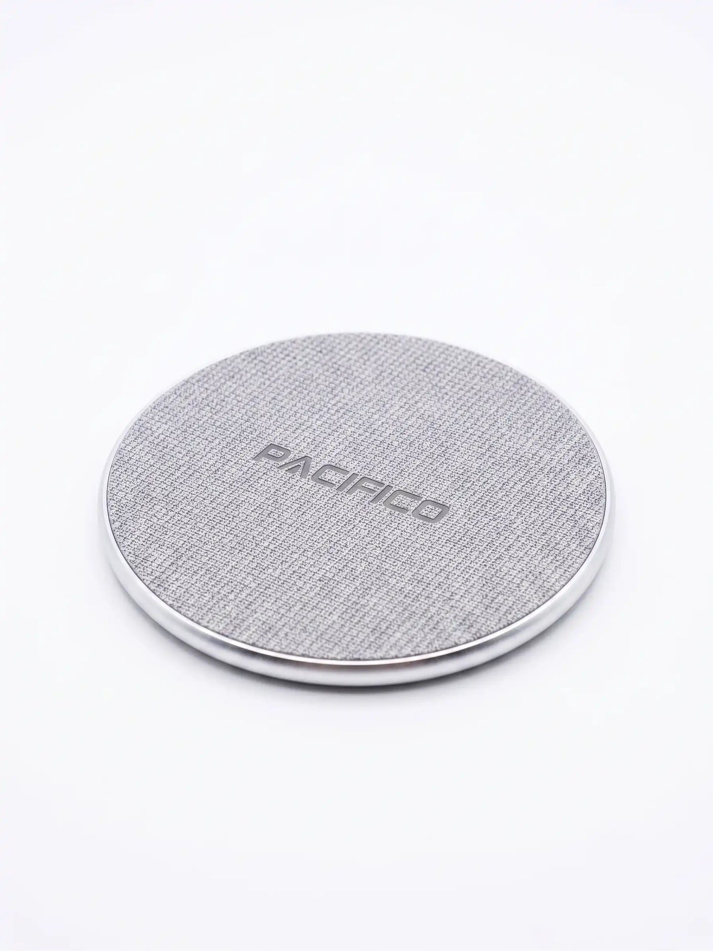 Gray wireless charging pad with 'Pacifico' branding on a white background